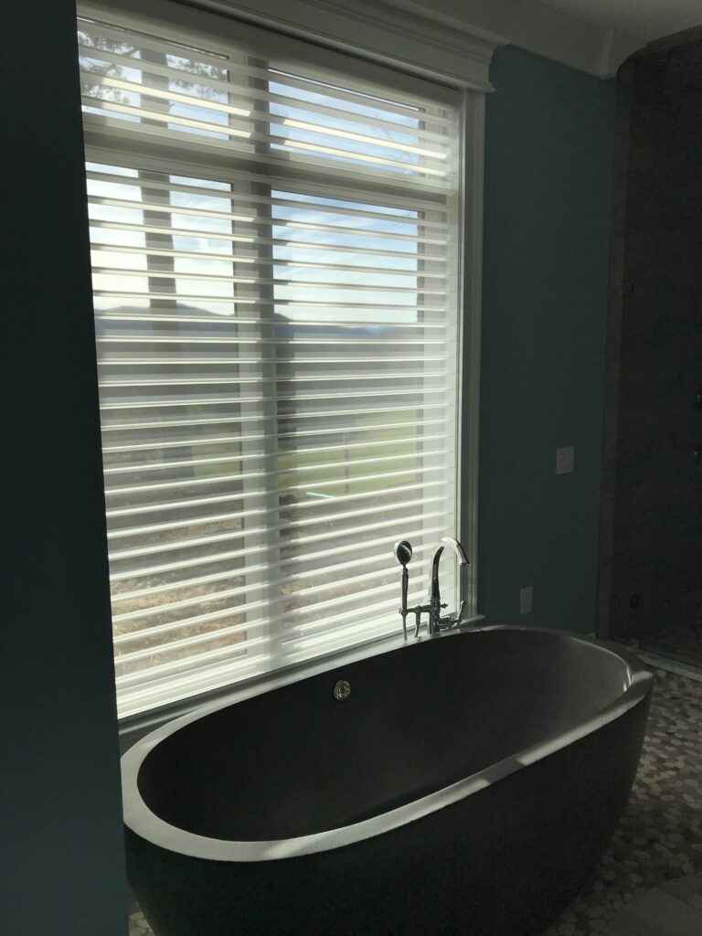 Hunter Douglas Silhouette sheer shades in a modern bathroom
